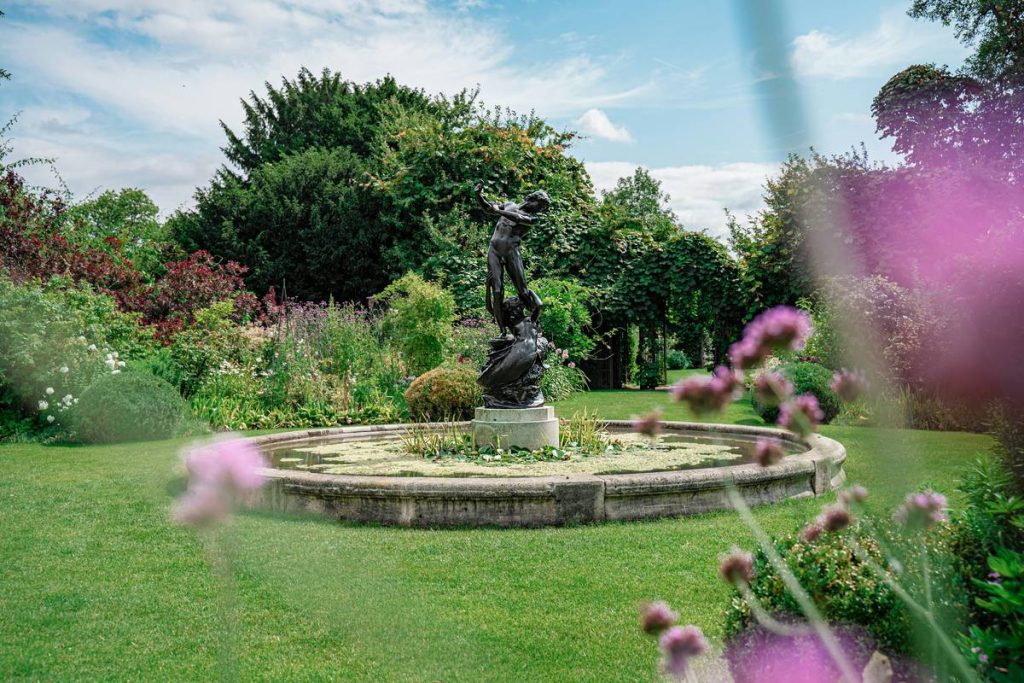 The pond of St John's Lodge Garden , a secret garden hidden in Regent's Park , London